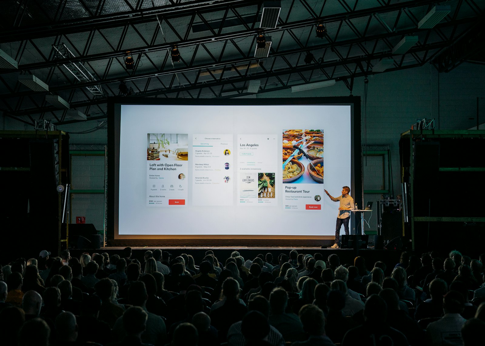Conference hall with an audience and a large screen